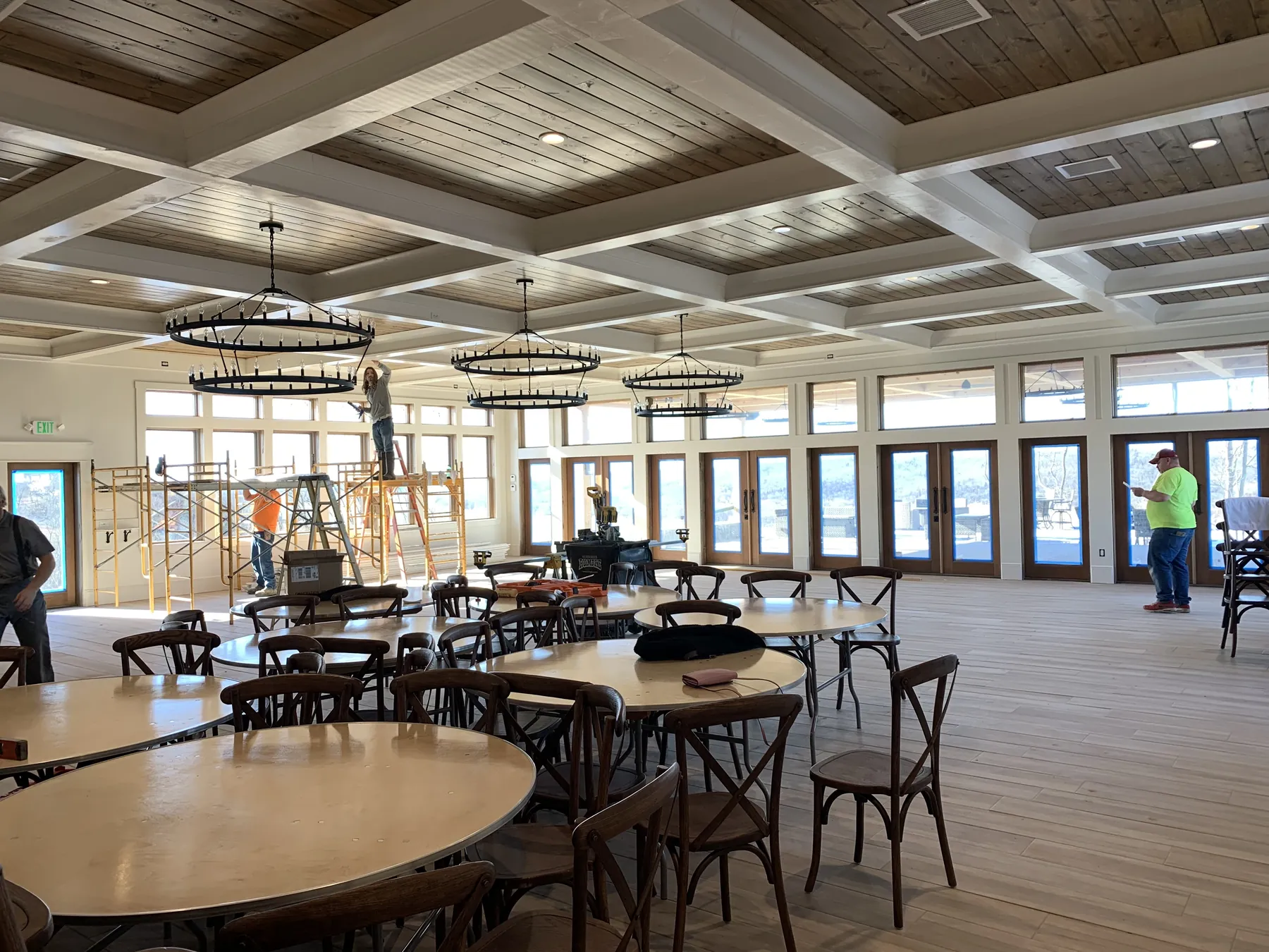 Coffered ceiling and chandeliers above the dining room